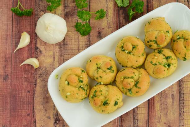 istock Garlic Knots with Herb Butter Sauce 1145209396