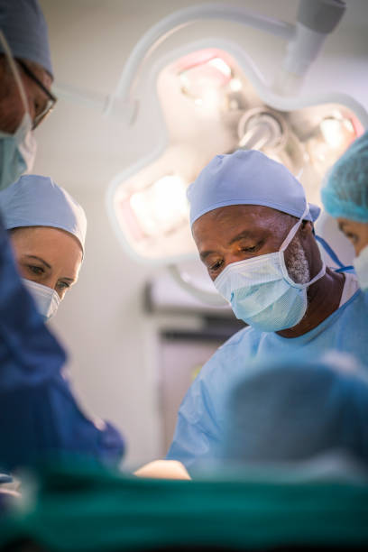 istock Medical team operating patient in emergency room 1145212269
