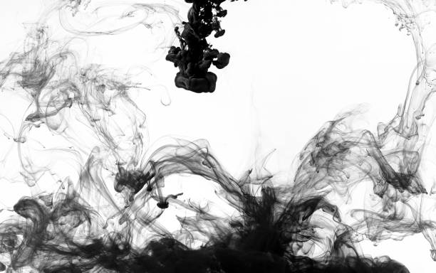 istock Black paint swirling in water 1145212333
