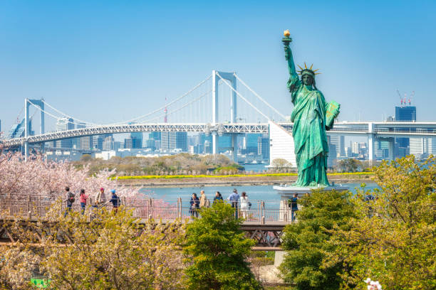 340+ Statue Of Liberty And Rainbow Bridge Tokyo Stock Photos