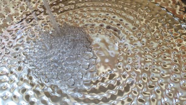 istock Reflections on stamped metal plate 1145215435