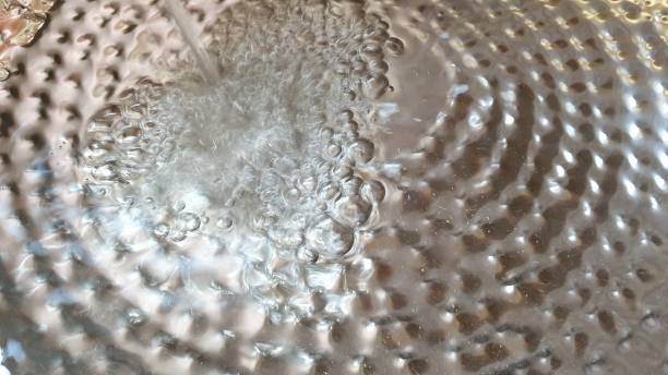 istock Reflections on stamped metal plate 1145215442