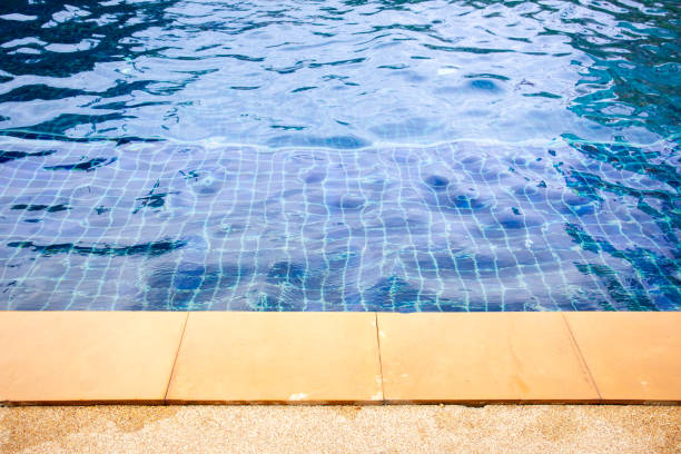 istock Beautiful blue water in the swimming pool background. 1145221756