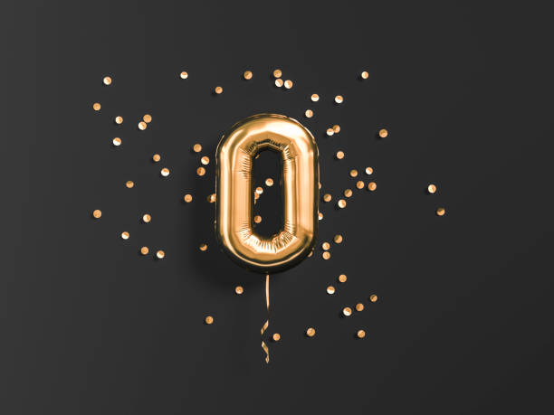 istock Zero counting concept. Number 0 flying foil balloon and gold confetti on black. 1145226327