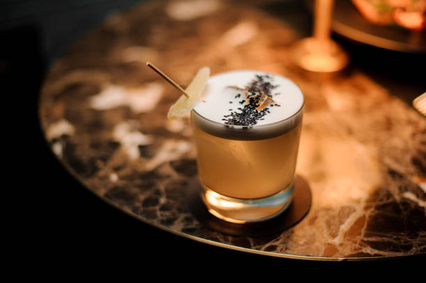 istock Cocktail with a foam decorated with a chia seeds on the table 1145228612