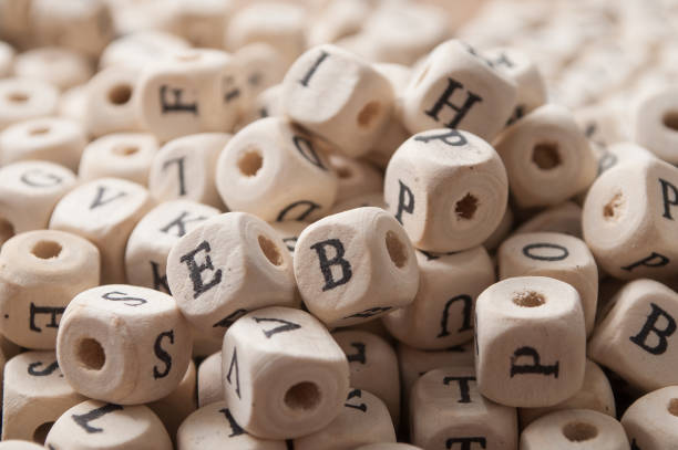 istock closeup of wooden letters stack 1145229528