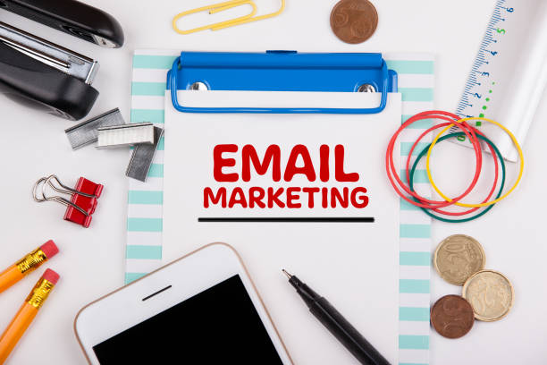 istock Email Marketing concept. Office desk with stationery 1145230862