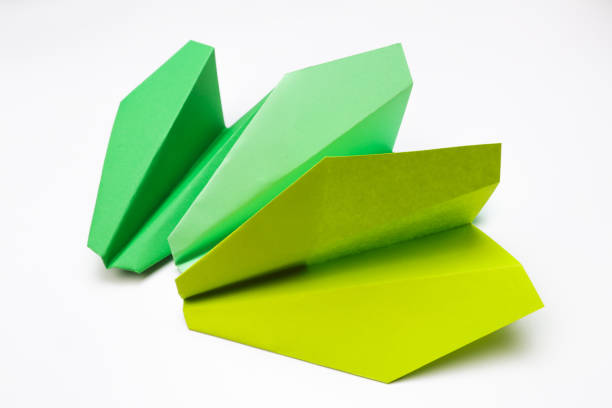 istock Colorful paper plane on white background, Business competition concept - Image 1145231678