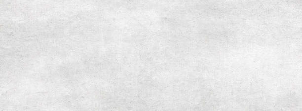 istock Long wide panoramic background in horizontal position.Light old monochrome texture with white and gray dirty surface.Design for art work. 1145233234