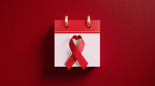 cinta de concienciación sobre el sida en el calendario - world aids day fotografías e imágenes de stock