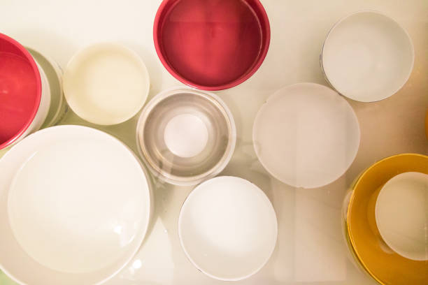 istock Abstract view of Multi Colored Plates and Bowls in Water 1145235846