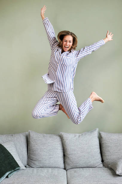 istock Jumping for joy girl 1145237488