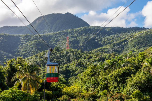 Teleferico, Puerto Plata, Dominican Republic Puerto Plata, officially known as San Felipe de Puerto Plata, is the ninth-largest city in the Dominican Republic. The Teleferico cable car was inaugurated in 1975 and offers the visitor a panoramic view of the city descending from the hill (779 m above sea level). cable car photos stock pictures, royalty-free photos & images