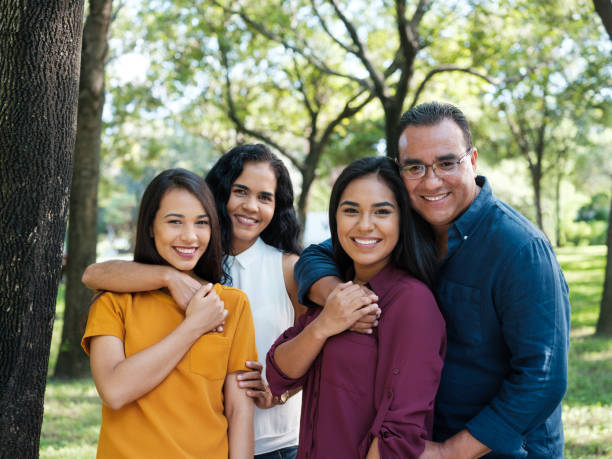 istock Loving latin family in a park 1145241088