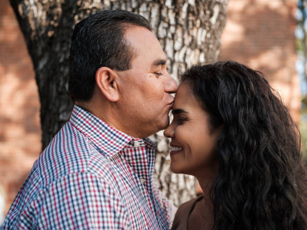 istock Affectionate husband kissing his wife on the forehead 1145241180