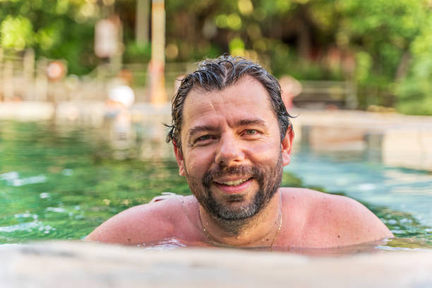 istock Brazilian man swimming in river 1145242015