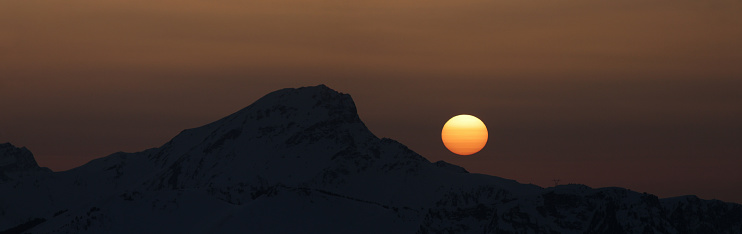 alpine landscape with setting sun