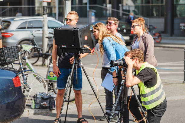 Shooting a movie or film at city street of Berlin 17 May 2018, Berlin, Germany: Shooting a movie or film at city street of Berlin television show stock pictures, royalty-free photos & images