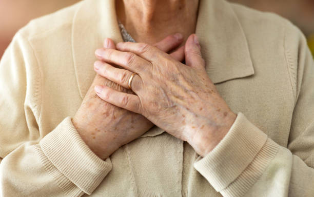 istock Senior Woman Suffering From Chest Pain 1145249270