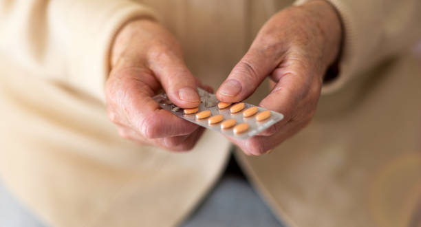 istock Senior woman about to take her medication 1145249314