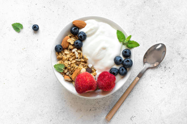 istock Healthy breakfast with yogurt, granola, berries 1145250305