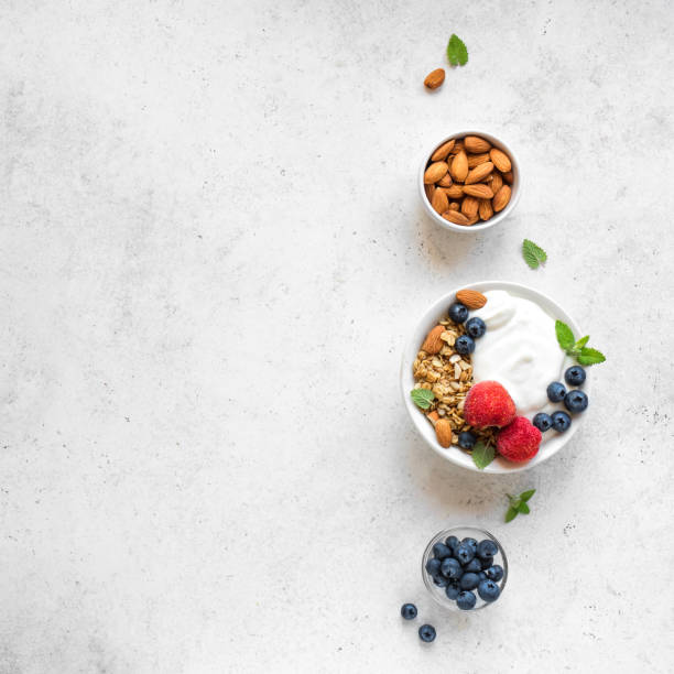 istock Healthy breakfast with yogurt, granola, berries 1145250316