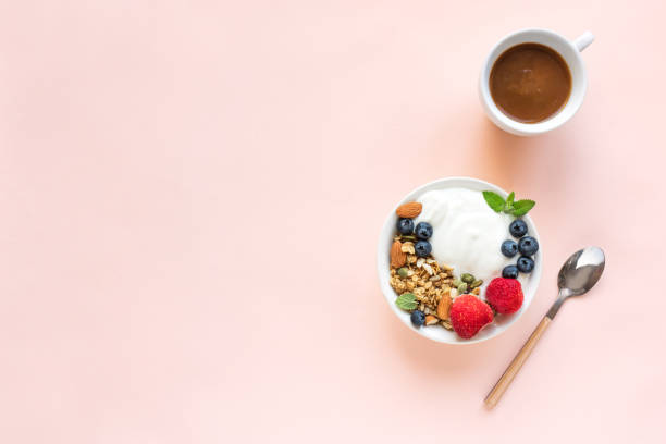 istock Healthy breakfast with yogurt, granola, berries 1145250374