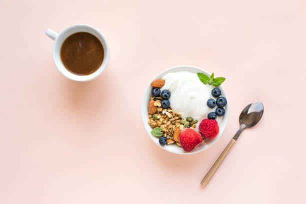istock Healthy breakfast with yogurt, granola, berries 1145250378