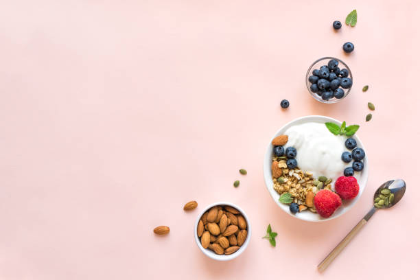 istock Healthy breakfast with yogurt, granola, berries 1145250392