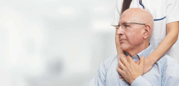 istock Health visitor and a senior man during home visit 1145251260