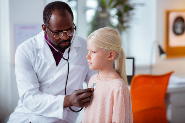 istock Girl feeling sad while having pain in lungs after cough 1145261548