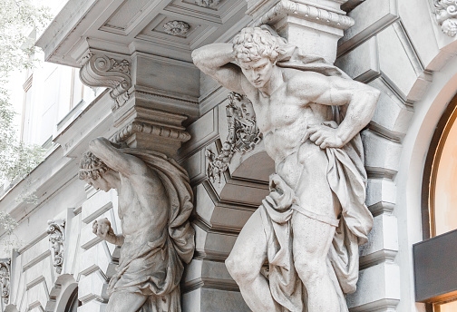 13 May 2018, Budapest, Hungary: Statues of the Atlases holding an balcony