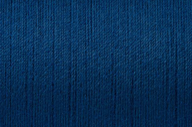 istock Macro picture of dark blue thread texture background 1145267383