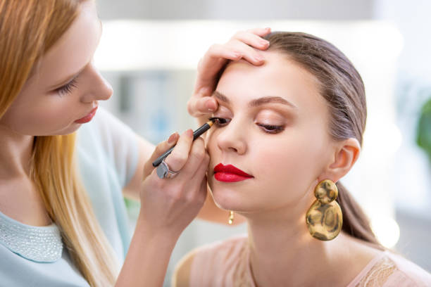 istock Nice young woman looking down with her eyes 1145268740
