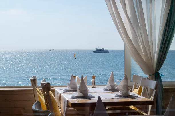 istock Restaurant with awesome view from open window on the sea. 1145269009