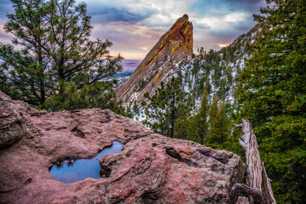 Colorful Sunset on Flatirons in Boulder, Colorado stock photo