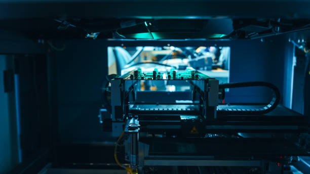 istock Automated Robotic Industrial Equipment is Testing Electronic Printed Circuit Board and Accept it with Green Light and Laser Technology After Assembly. 1145276378