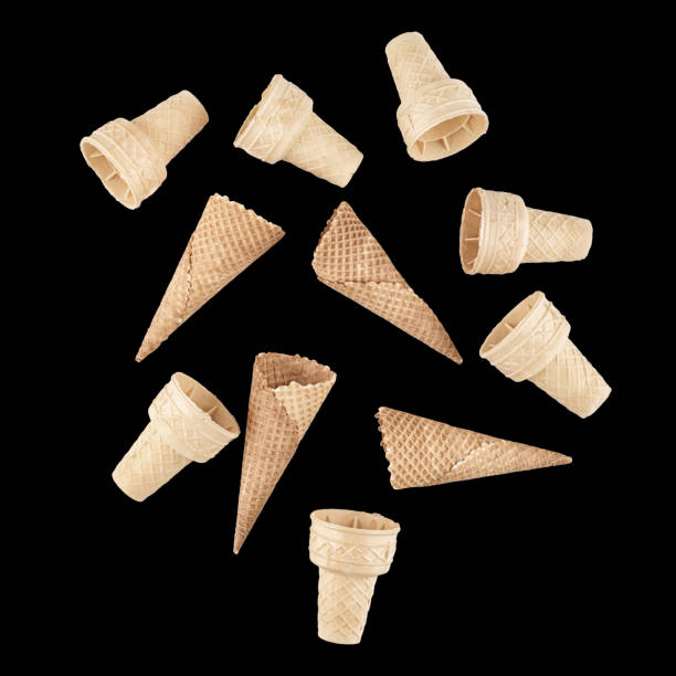 istock ice cream cones on a black background 1145277681
