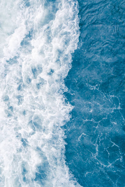 istock Pale blue sea wave during high summer tide 1145281765