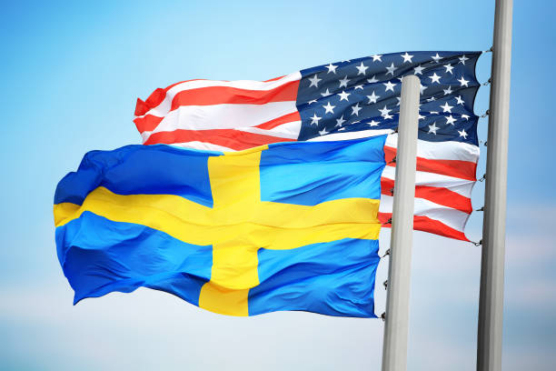 флаги швеции и сша - day sky swedish flag banner стоковые фото и изображения