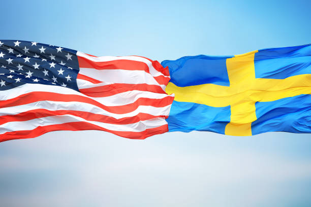 flags of the usa and sweden - day sky swedish flag banner imagens e fotografias de stock