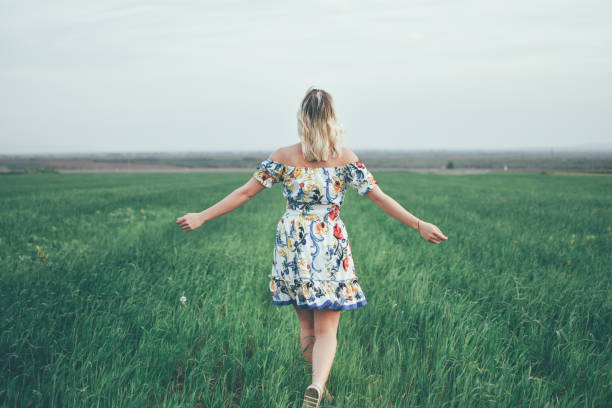 istock Beautiful woman in a meadow 1145285945