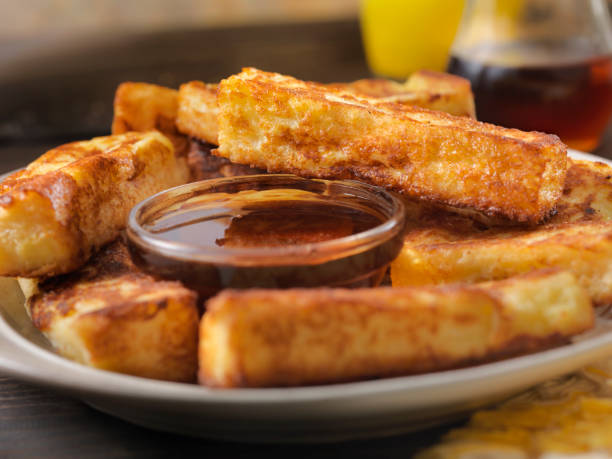 Crispy French Toast Fingers with Maple Syrup Crispy French Toast Fingers with Maple Syrup french toast stock pictures, royalty-free photos & images