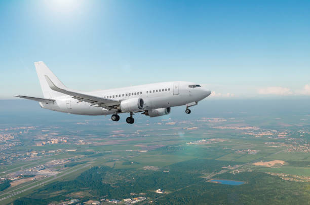 istock Aircraft approach before landing with landing gear. 1145289888