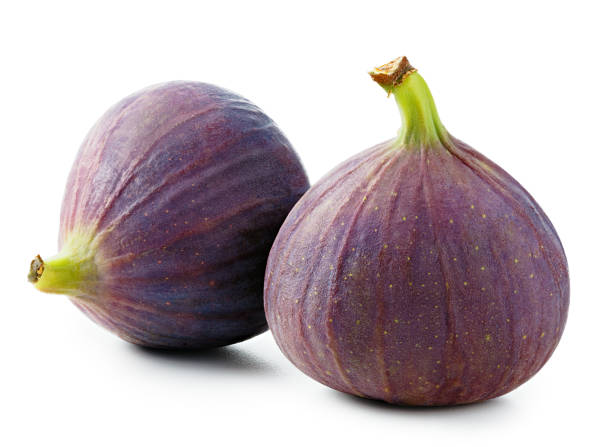 Figs isolated on white Figs isolated on white background fig stock pictures, royalty-free photos & images