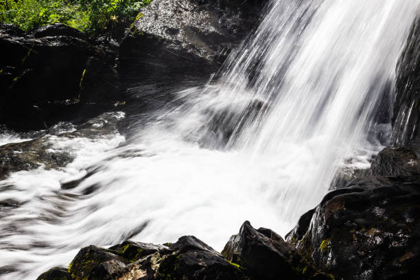 istock Vertical waterfall in rocks. Mountain river in mountains. 1145290854