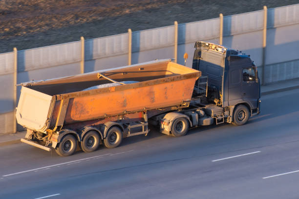 istock Truck with a trailer for bulk driving on the highway 1145291038