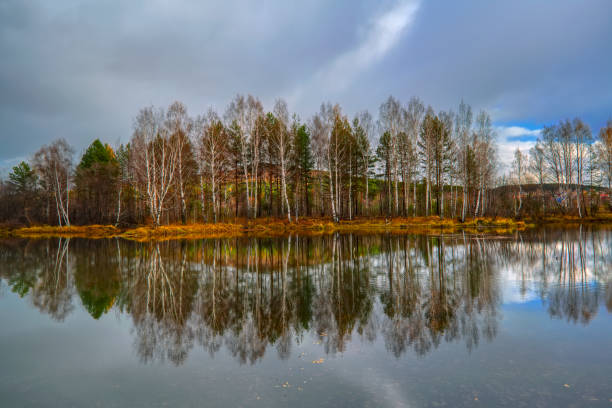 istock Autumn landscape sunny warm day in the forest by the river 1145291322