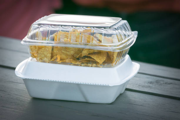 Single use plastic and Styrofoam food containers ready for take out from a restaurant. stock photo