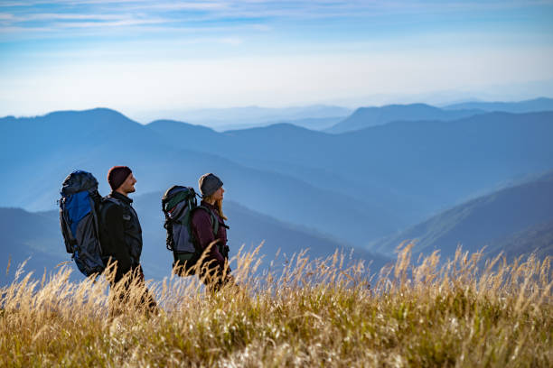 istock The happy couple walking on the mountain 1145304674